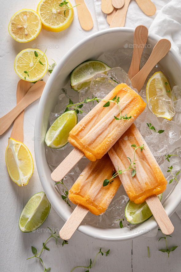 Juicy ice cream sorbet made of limes and lemons. Stock Photo by Shaiith