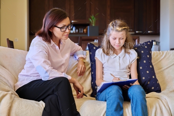 Individual therapy session for child girl with psychologist