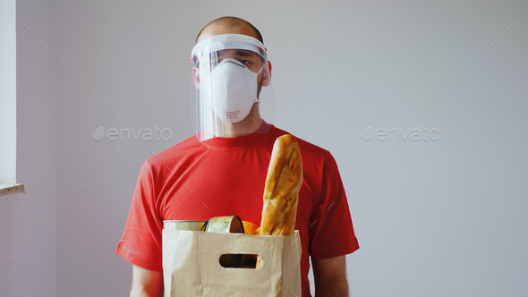 Portrait of food delivery man with mask