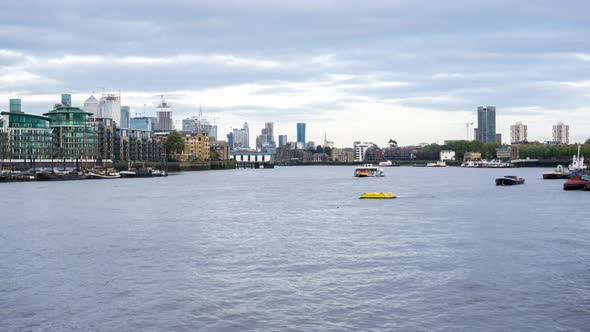 London cityscape with Cargo Ships on Thames River, Water Transport, Wapping, London, UK alt
