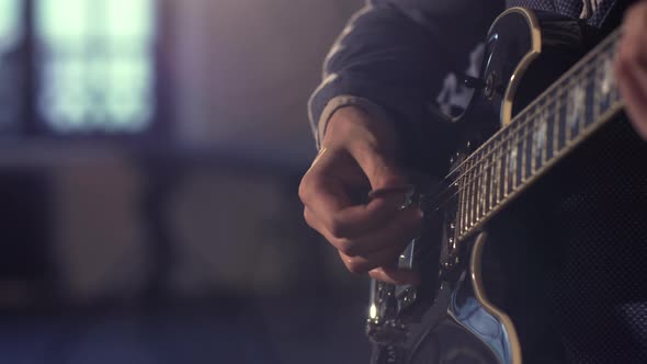 Young man playing  alt