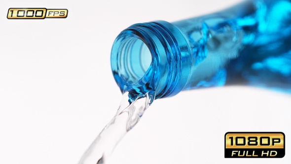 Pouring Drinking Water out of a Blue Bottle alt