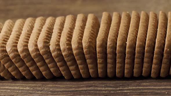 Tasty cookies biscuits on wooden background