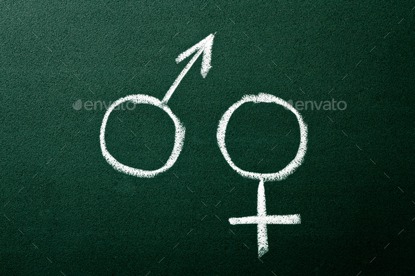 Gender symbols on green blackboard - Stock Photo - Images
