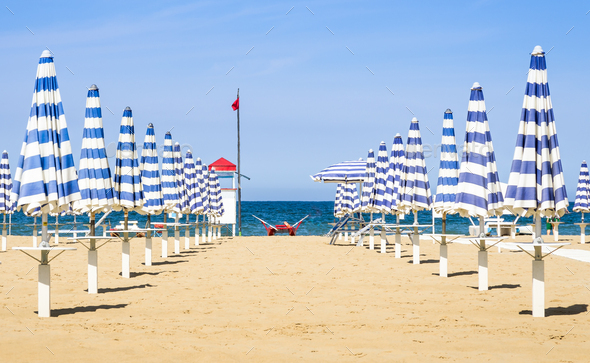 Umbrellas and rescue station at Rimini beach - Italian summer