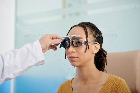 Doctor Measuring Distance Between Eyes - Stock Photo - Images