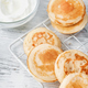 Mini pancake cereal with banana, raspberry, strawberry, honey, yogurt for breakfast. - PhotoDune Item for Sale