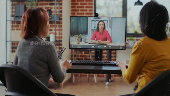 Women meeting with applicant on video call at online job interview