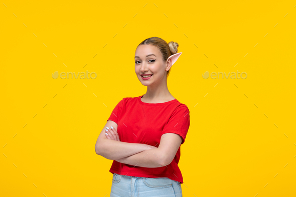 front view young female in red t-shirt with elf ears yellow background cartoon