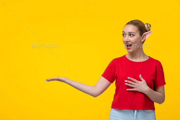 young female in red t-shirt with elf ears yellow background cartoon girl
