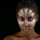 Art photo of Africal woman with tribal ethnic paintings on her face - PhotoDune Item for Sale