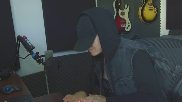 Slow Motion of Female Producer Working at Studio alt