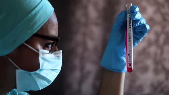 Doctor hands holding a coronavirus COVID-19 negative test tube