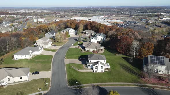 Aerial view of Eau Claire residential neighborhood in autumn. Solar panels seen in use.