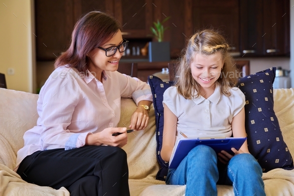 Individual therapy session for child girl with psychologist