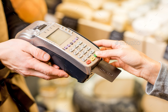 Paying with card in the food store - Stock Photo - Images