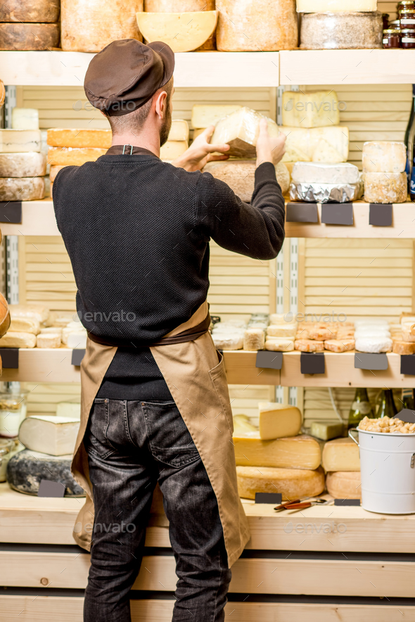 Cheese seller at the shop