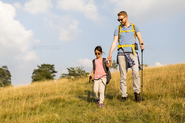 Father and daughter hiking Stock Photo by BGStock72 | PhotoDune