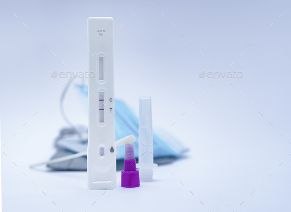 Rapid nasal antigen swab test for the detection of the Covid 19 virus, positive result - Stock Photo - Images