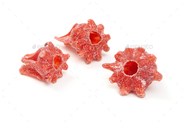 Candied hibiscus flowers isolated on white background. - Stock Photo - Images
