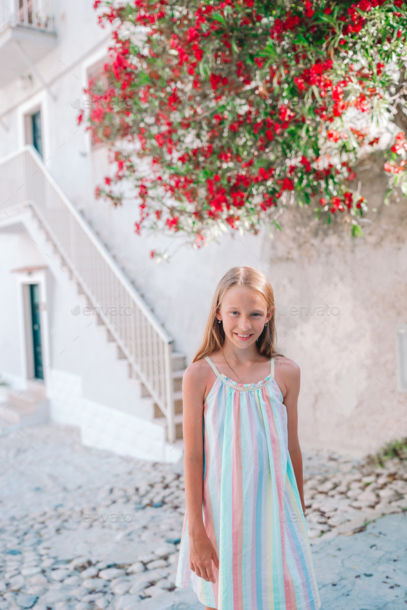 Portrait Of Little Girl Outdoors In Summer Stock Photo, Picture