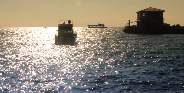 Boat Over The Sea at Sunset