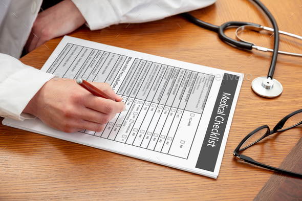 Medical checklist. Woman doctor, wooden office table. Female hand over document, close up