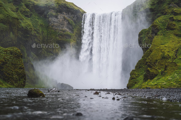 Beautiful Skogafoss waterfall. The most popular destination in Iceland. Water falling down a - Stock Photo - Images