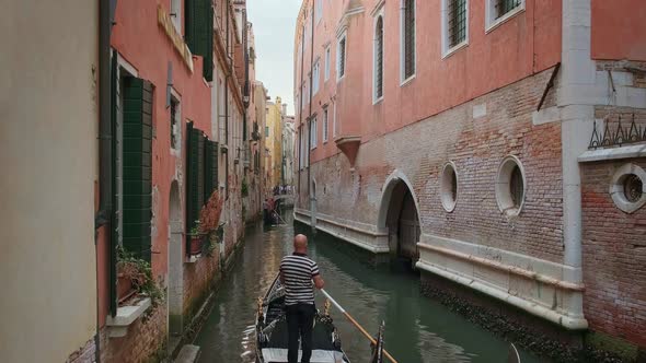 Gondola Go Down Canal at Day Venice Italy