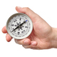 Hand holding traditional magnetic compass - PhotoDune Item for Sale