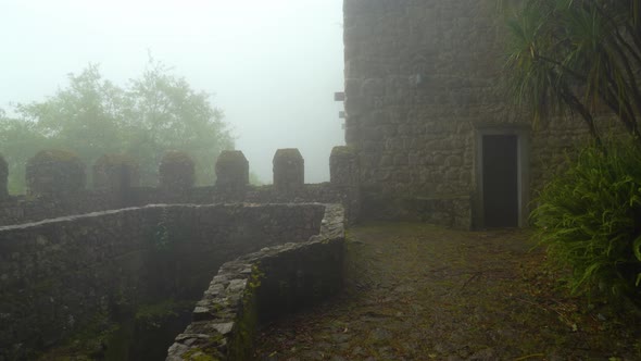 Defensive Guard Tower Wall of Moors Castle with Very Thick Fog and Mist Covering Area