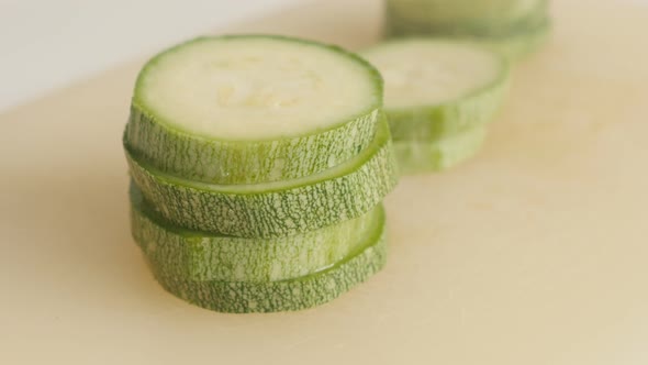 Pepo cylindrica on cutting board close-up 4K 2160p 30fps UltraHD tilting  footage - Cuts of organic  alt