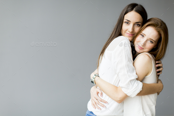 Embracing friends - Stock Photo - Images
