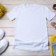 Womens white T-shirt mockup with yellow flowers - PhotoDune Item for Sale