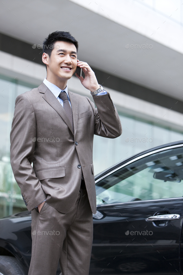 Young businessman on the phone - Stock Photo - Images