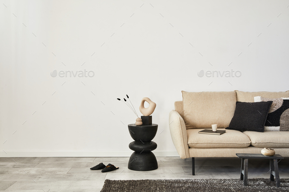 Creative composition of elegant minimalist living room interior