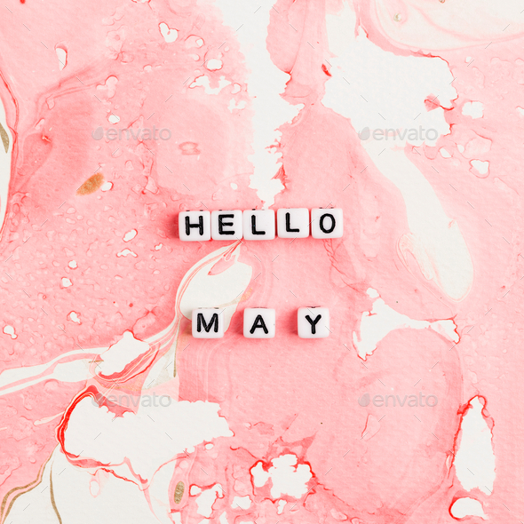 HELLO MAY beads message typography on pink - Stock Photo - Images