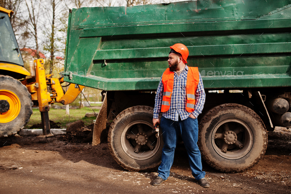 Beard worker man suit construction worker in safety orange helmet