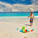 Three year old toddler playing on beach - PhotoDune Item for Sale