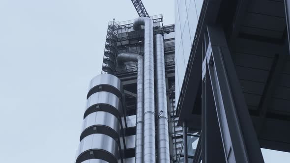 Revealing shot of the LLoyd's Building in London alt