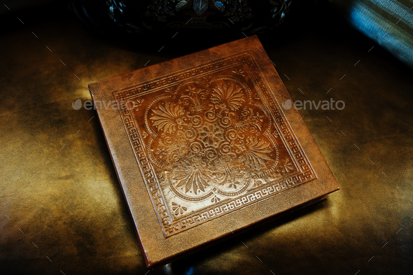 Brown leather wedding book and album, cover with stamping