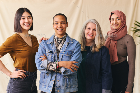 International Women\'s Day portrait of cheerful multiethnic mixed age range women