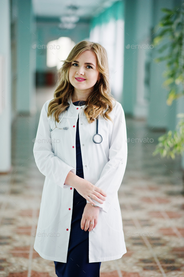Doctor in White Coat with Stethoscope Poses on Camera with Serious Face,  People Stock Footage ft. analyze & attractive - Envato Elements