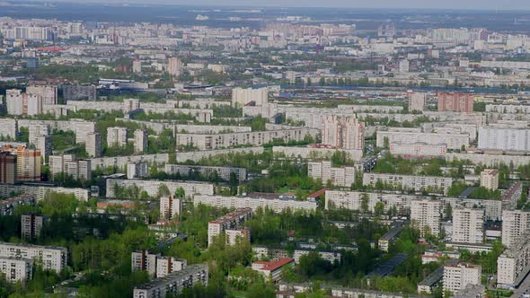 A View From a Helicopter Flying Over an Urban Area on Sunny Summer Day alt