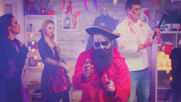 Young Bearded Man Dressed Up Like a Pirate alt