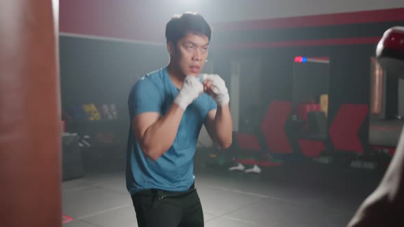 Active African american Fitness trainer teach and motivate young sportsman exercising doing boxing alt