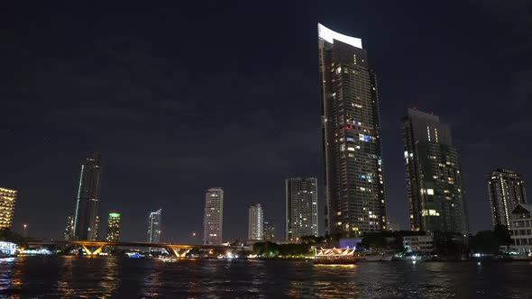 metropolis with skyscrapers at night. office corporate buildings in bangkok alt