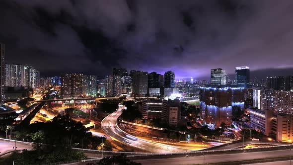 Night time lapse of Kowloon Traffic with Light Pollution in Hong Kong alt