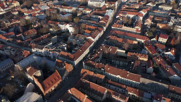 AERIAL: Kaunas Oldtown with Beautiful Golden Hour Light on Medieval Houses alt