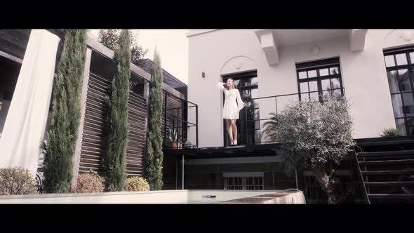 Woman at a Beach House alt